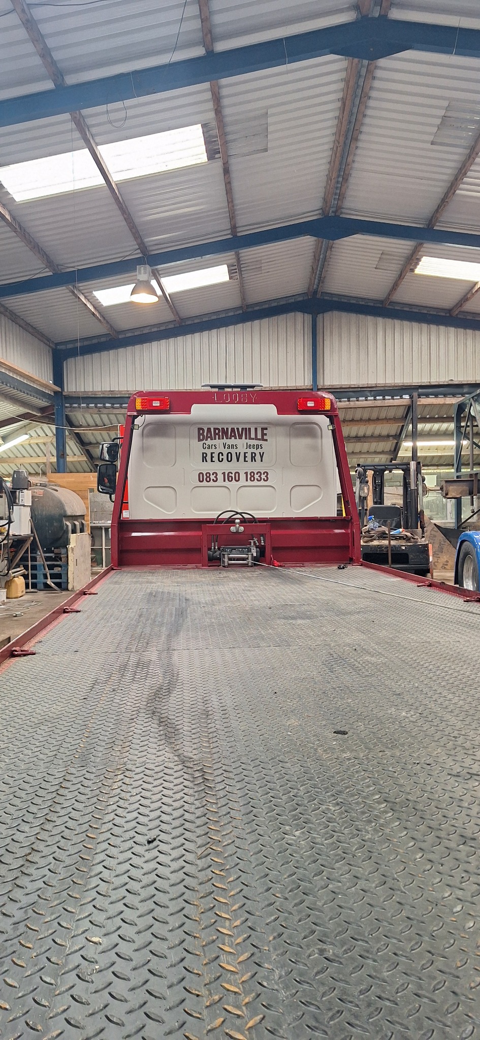 Recovery bed and winch inside the workshop